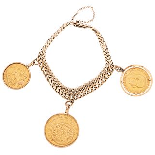 BRACELET WITH DEMONETIZED COINS OF 21.6K, 18K, 14K AND 8K WITH SECURITY CHAIN IN BASE METAL Weight: 63.9 g