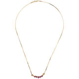 CHOKER WITH RUBIES AND DIAMONDS IN 14K YELLOW GOLD 5 rubies ~0.38 ct and 8 diamonds ~0.08 ct. Weight: 7.2 g. Length: 18.3" (46.5 cm)