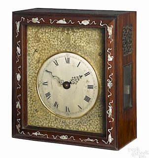 Chinese carved hardwood bracket clock, 19th c., with an elaborate cast brass bezel