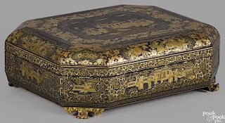 Chinese black lacquer box, mid 19th c., with a compartmented interior and ivory game pieces, 5'' h.
