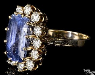 Sapphire and diamond ring, 14K gold setting with a rectangular cushion cut
