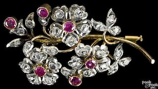 Diamond and ruby floral brooch, yellow gold and silver floral sprig, petals, and leaves