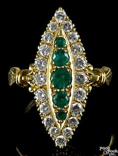 Gold, emerald, and diamond marquise head ring, marked 18K, with five central round cut emeralds