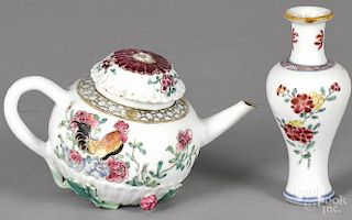 Chinese famille rose teapot, mid 18th c., with rooster decoration and applied vines and berries