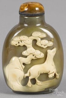 Two Chinese agate snuff bottles with cameos of a horse beneath a tree, 2 3/4'' h.
