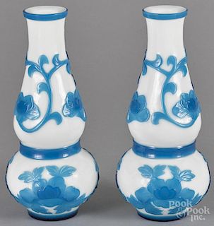 Pair of Chinese turquoise and white glass vases with floral decoration, 9'' h.