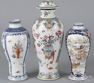 Three Chinese export porcelain garniture vases, late 18th c., 13'' h., 10'' h., and 9 1/4'' h.