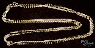 Yellow gold double-curb link chain, 54'' l., 31.8 dwt