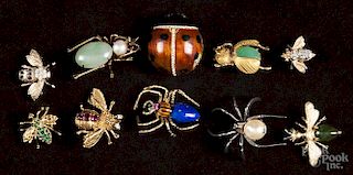 Eight yellow gold and gemstone insect brooches, to include flies, beetles, and spiders with stone