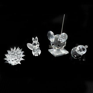 Lote de 4 figuras decorativas. Austria. SXX. Elaborados en cristal Swarovski. Consta de: panda, ratón, puercoespín y zorro.
