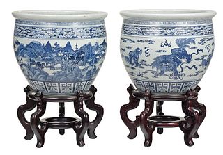 Two Chinese Blue and White Planters With Stands