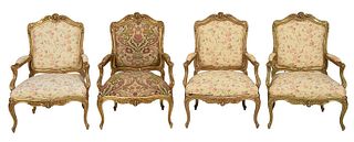Suite of Four Louis XV Style Carved Open Armchairs
