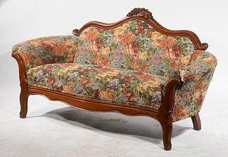 AMERICAN 19TH C. CAMELBACK UPHOLSTERED WALNUT SETTEE