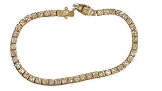14 Karat Gold and Diamond Tennis Bracelet, set with 47 diamonds approximately .10 carats each, approximately 4 - 4.7 carats total weight, length 7 inc