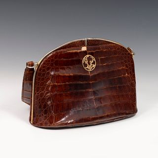 VIVIEN LEIGH. 
Handbag, 1950s. 
Alligator skin and metal. 
With mirror and purse inside.