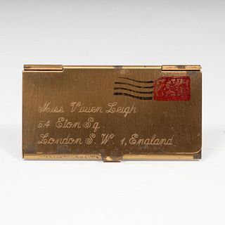 VIVIEN LEIGH. 
Seal holder box. England, ca. 1960. 
Gold metal. 
With the address of the actress's home incised on the front.