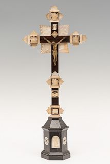 Holy land cross; 19th Century.
Rosewood and carved mother-of-pearl.
It has a locket on the back.