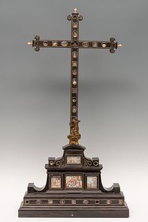 Reliquary cross; Italy, 17th century. Ebony, chiseled bronze mounts, gouache on vellum and carved bone.