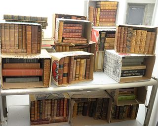 Large Lot of Mostly Leather Bound Books, approximately 30 boxes.