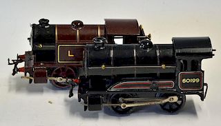 Hornby 0 Gauge LMS Clockwork Tank Locomotive (L.M.S Livery) numbered 2115, with red wheels with some