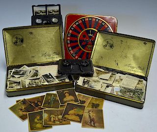 Quantity of Small Stereo cards and Cigarette cards to include 2x Bakerlite stereo card viewers in ar