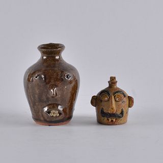 2 North Carolina Miniature face jug