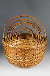 Nest of 8 William Sevrens  Round Swing Handle Baskets, circa 1995