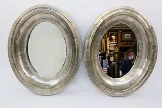 Two Riveted Silver Gilt Oval Mirrors