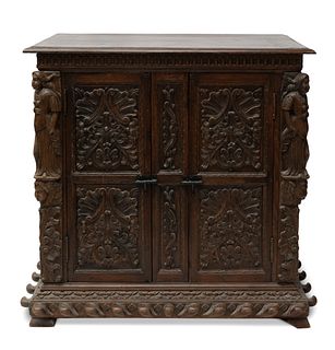 Cabinet. Spain, following Renaissance models of the 16th century. 
Carved pine and oak wood.