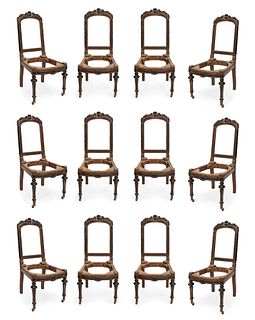Set of twelve Napoleon III chairs. France, second half of the 19th century. 
Carved wood. No upholstery.