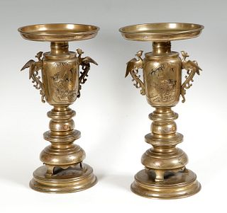 Japanese candlesticks from the 18th century. 
Bronze, inlaid with silver, gold and copper.
