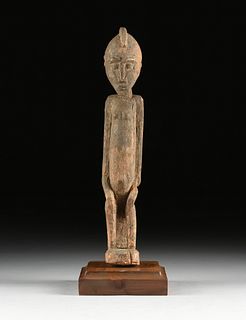 AN AFRICAN WOOD FEMALE FERTILITY FIGURE, PROBABLY DOGON, 19TH/20TH CENTURY,