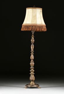 A BAROQUE STYLE SILVER AND BRONZE LEAFED WOOD FLOOR LAMP, LATE 20TH CENTURY,