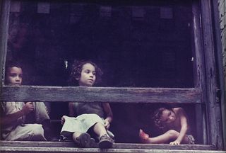 HELEN LEVITT (American 1913-2009) A PHOTOGRAPH, "Three Children at Windsor," 1959,