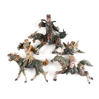 A GROUP OF FOUR CHINESE GLAZED EARTHENWARE ROOF DEITIES,