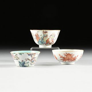 A GROUP OF THREE QING DYNASTY PORCELAIN TEA BOWLS, 1644-1912,