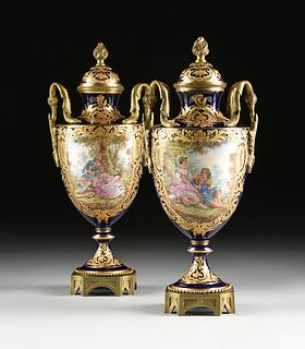 A PAIR OF SÃˆVRES STYLE ORMOLU MOUNTED PARCEL GILT AND PAINTED VASES, BY BLOCH & CIE, MARKED, EARLY 20TH CENTURY,