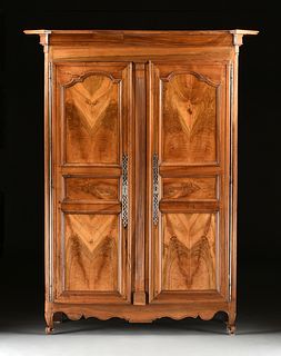A LARGE FRENCH PROVINCIAL CARVED CHERRY ARMOIRE, CIRCA 1800,  