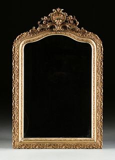A FRENCH ROCOCO REVIVAL SILVER-LEAFED AND PARCEL-GILT MANTLE MIRROR, LATE 19TH CENTURY, 