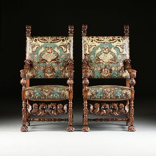 A PAIR OF ITALIAN BAROQUE STYLE EMBOSSED LEATHER UPHOLSTERED WALNUT ARMCHAIRS, LATE 19TH/EARLY 20TH CENTURY,