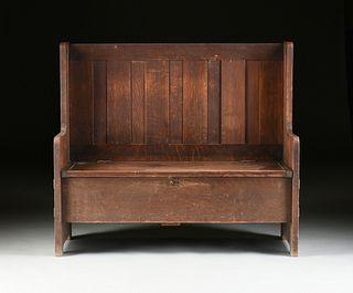 GUSTAV STICKLEY (American 1858-1942)  AN OAK HALL SEAT, LABELED,  NO. 224, CIRCA 1909,