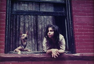 HELEN LEVITT (American 1913-2009) A PHOTOGARPH, "Girl/Dog at Windsor,"