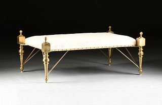 A LARGE RENAISSANCE REVIVAL STYLE HIDE UPHOLSTERED BRASS OTTOMAN, 20TH CENTURY, 