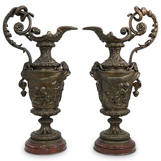 Pair of Bronze Figural Ewers