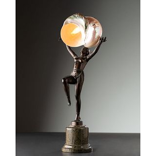 An Art Deco Patinated Bronze and Nautilus Shell Figural Table Lamp