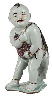 Chinese Ceramic Figure of Boy Carrying Fish