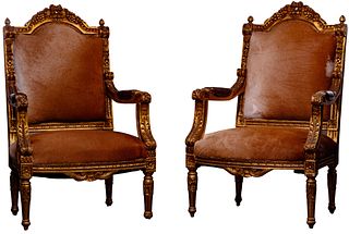 Cowhide and Gilt Wood Arm Chairs