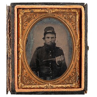 [CIVIL WAR]. Ninth plate ambrotype of soldier posed with knife. N.p.: n.p., [1860s].