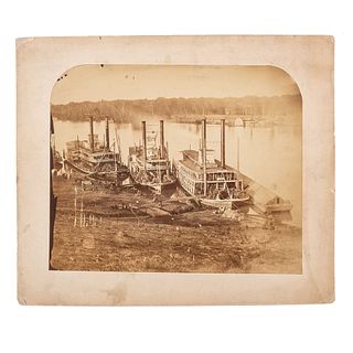 [CIVIL WAR]. Albumen photograph of three docked steamers, incl. USS Tigress, Hannibal, and Universe. N.p.: n.p., [1860s].