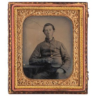[CIVIL WAR]. A sixth plate ambrotype of an armed Confederate private. N.p.: n.p., n.d.